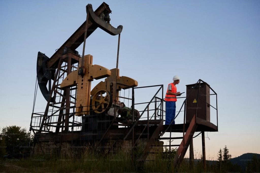 engineer working on an oil recovery site